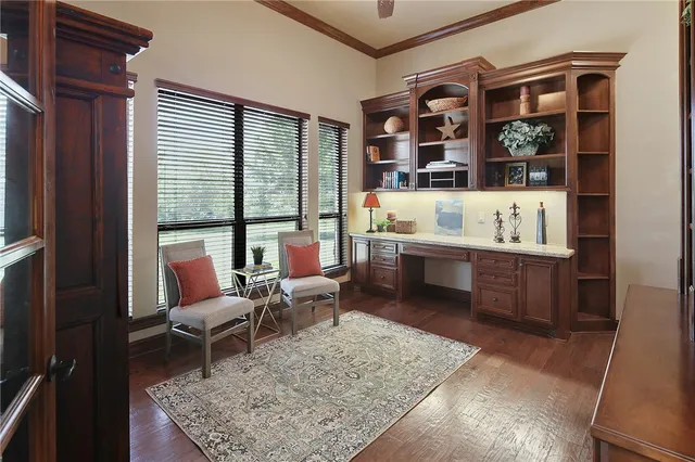 a living room with furniture and a rug