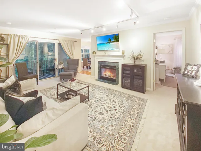 a spacious bedroom with a bed and a cabinets