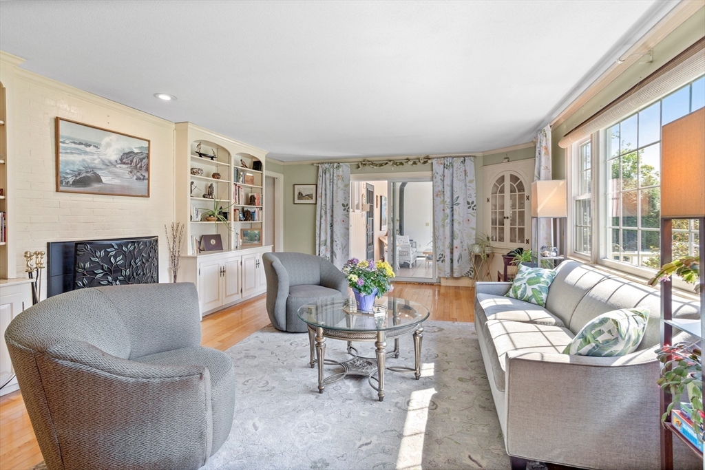 717 George Hill Road Lancaster, MA 01523 - Photo 12 of 36 a living room with furniture and large windows