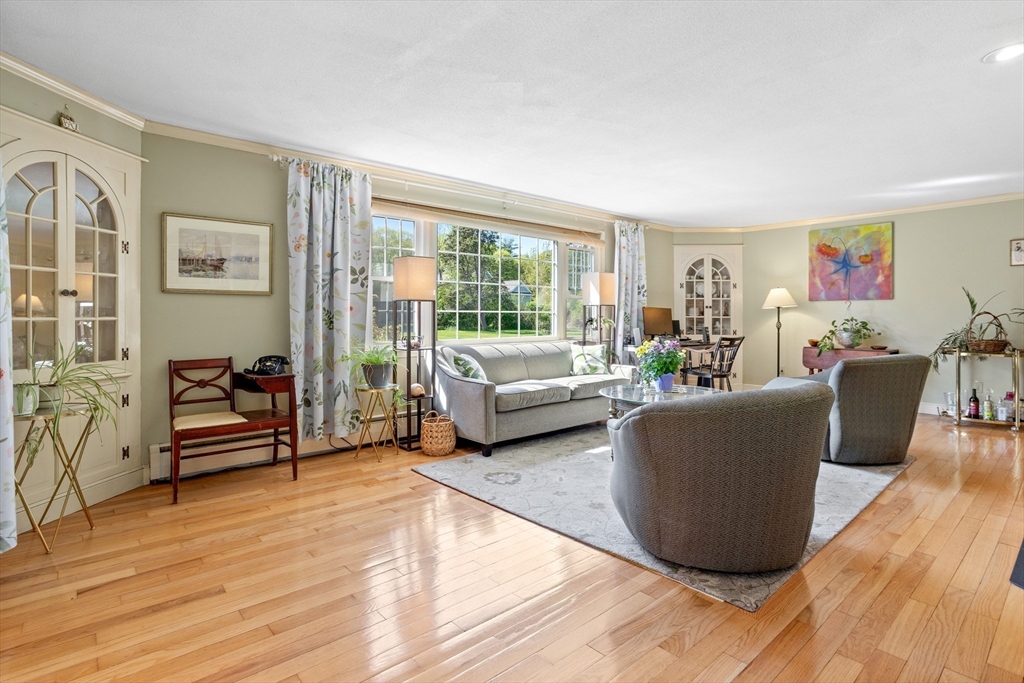 717 George Hill Road Lancaster, MA 01523 - Photo 13 of 36 a living room with furniture and a window