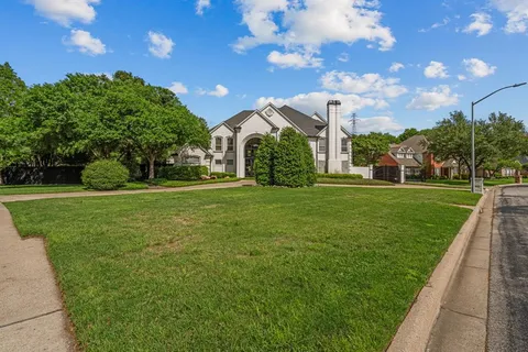 a view of a house with a big yard