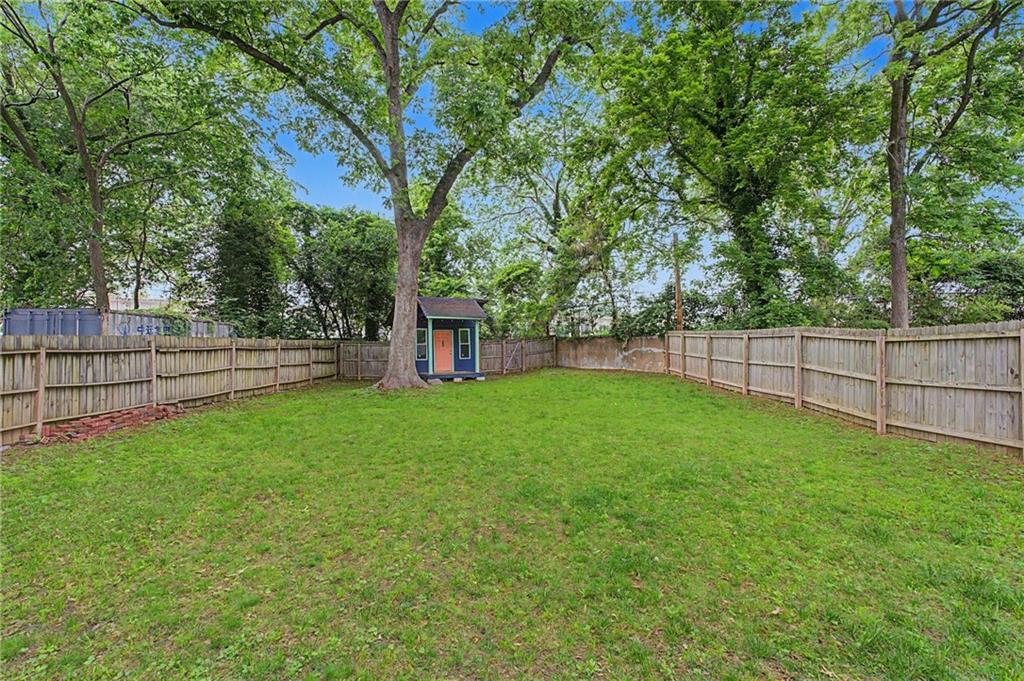 827 Elbert Street Southwest Atlanta, GA 30310 - Photo 27 of 33 a view of a yard with a large trees
