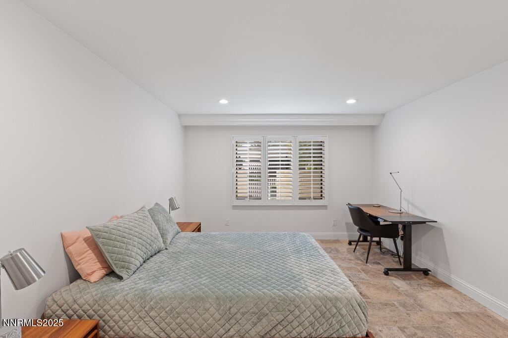 4811 Lakeridge Terrace West Reno, NV 89509 - Photo 31 of 43 a bedroom with a bed and a window