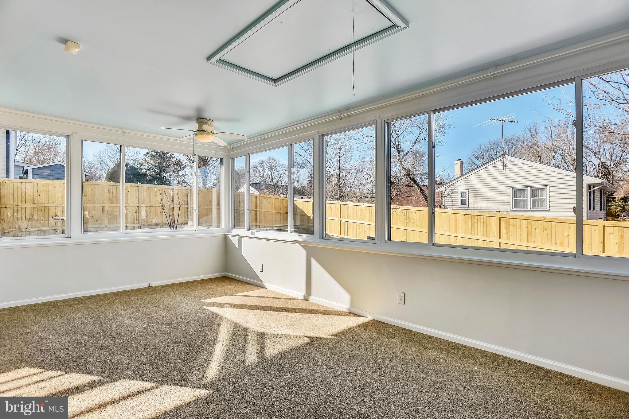 7308 Foxe Place Springfield, VA 22151 - Photo 16 of 38 a living room with a large window