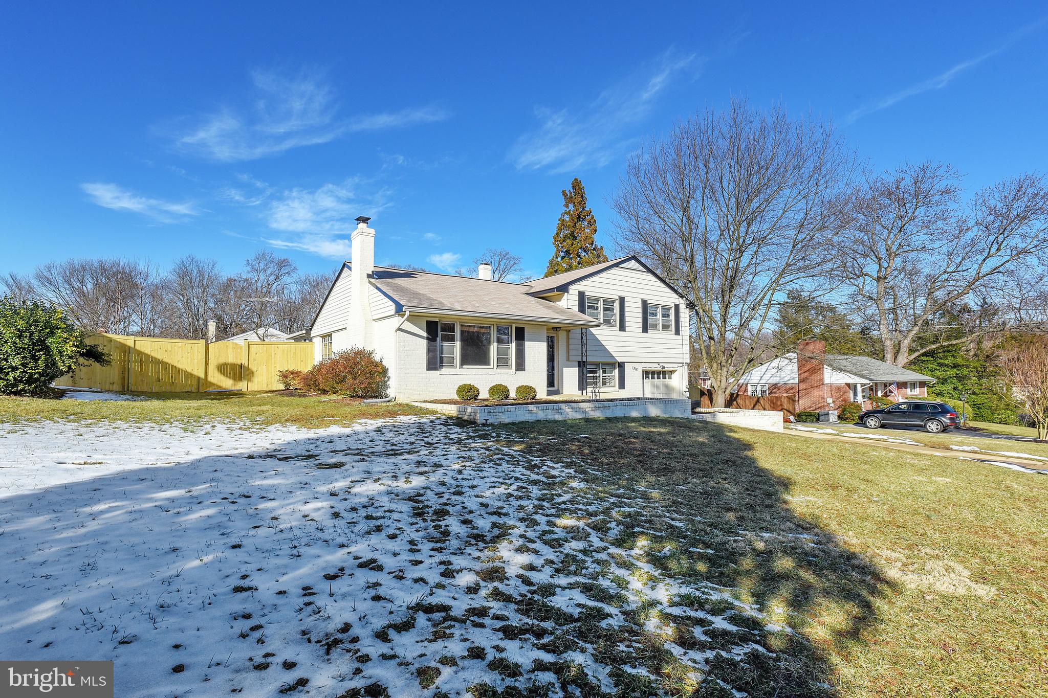 7308 Foxe Place Springfield, VA 22151 - Photo 20 of 38 a front view of a house with a yard