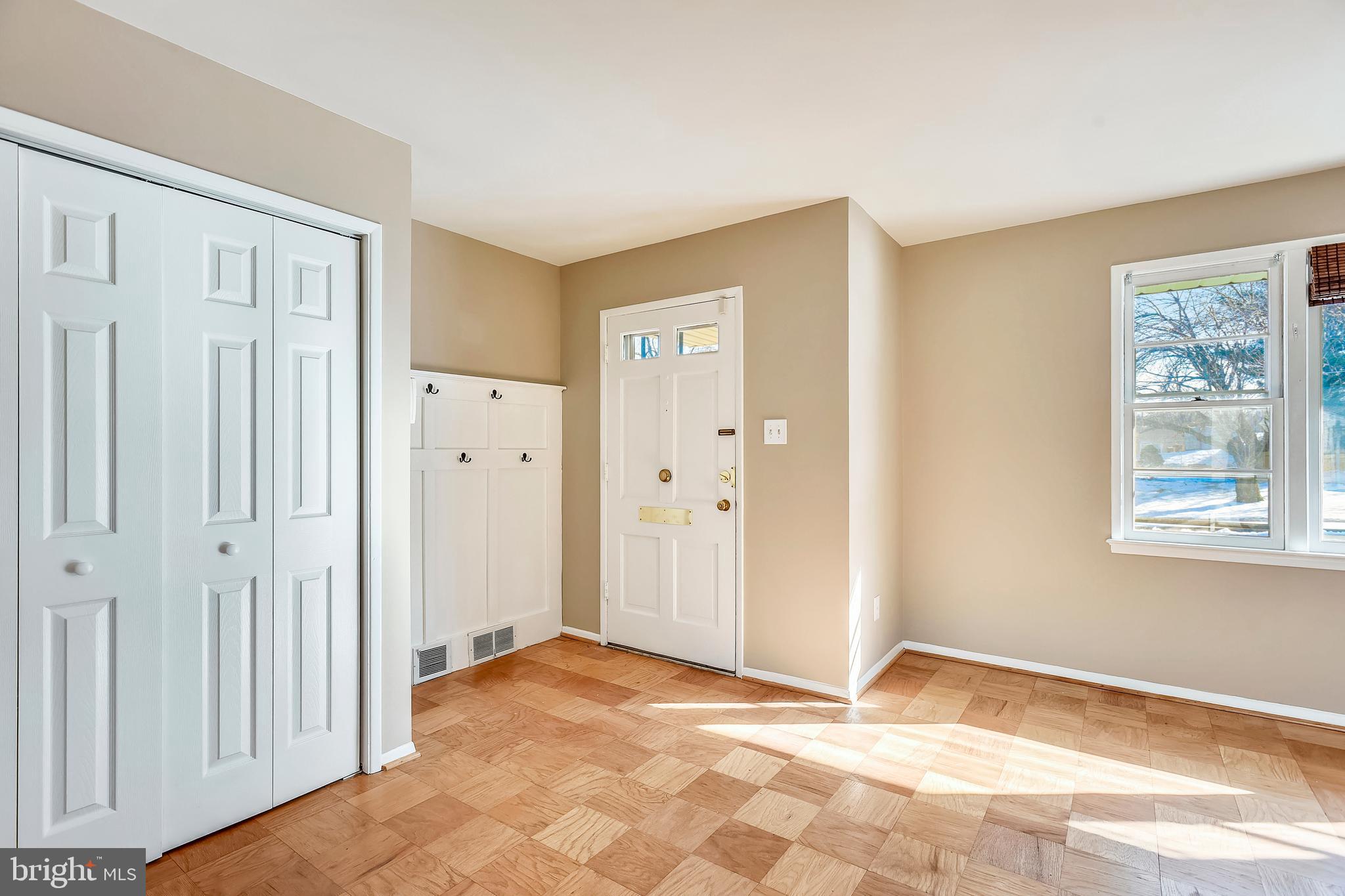 7308 Foxe Place Springfield, VA 22151 - Photo 4 of 38 a view of an empty room with window and refrigerator
