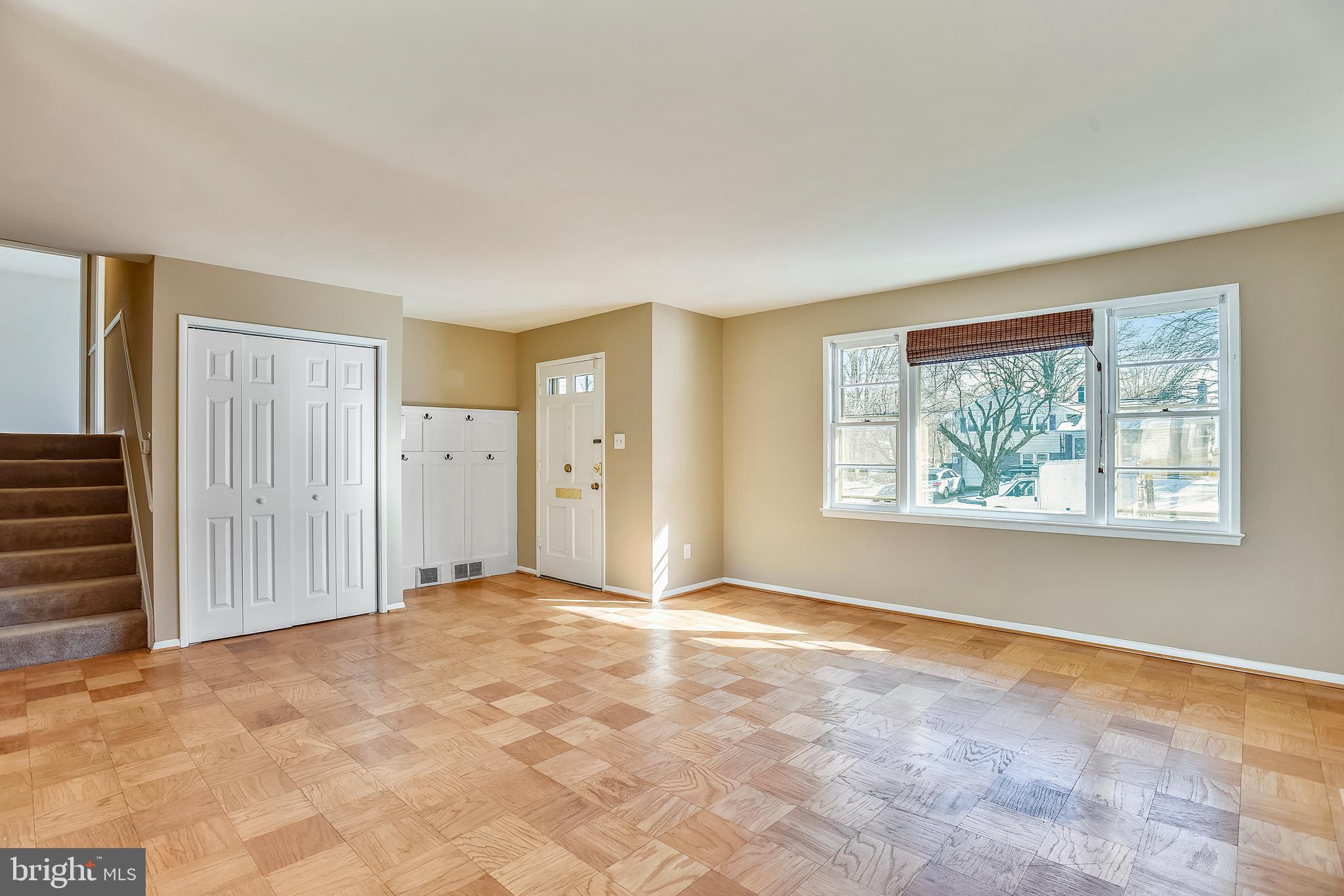 7308 Foxe Place Springfield, VA 22151 - Photo 5 of 38 a view of an empty room with a window