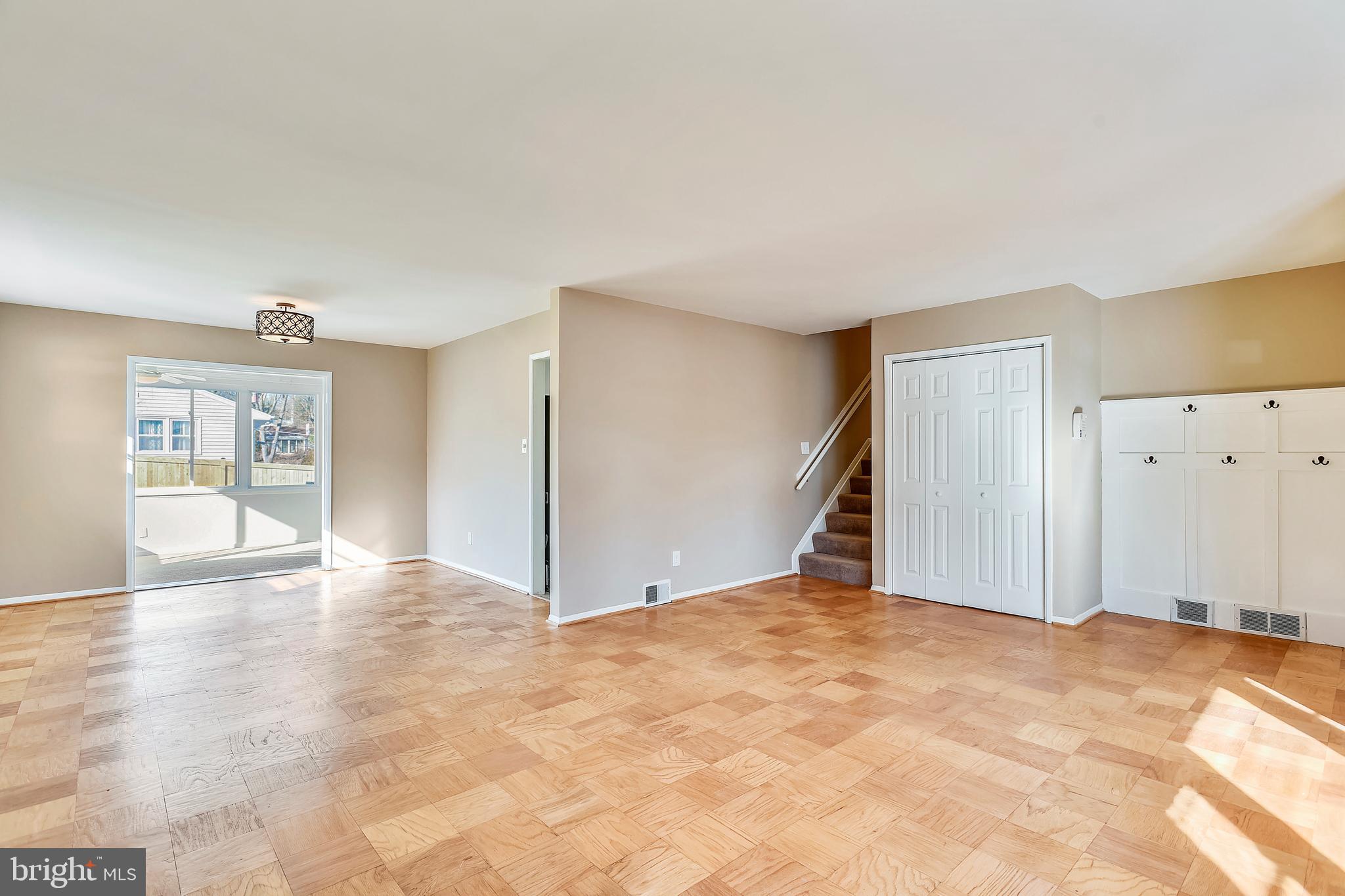 7308 Foxe Place Springfield, VA 22151 - Photo 6 of 38 a view of an empty room with a window