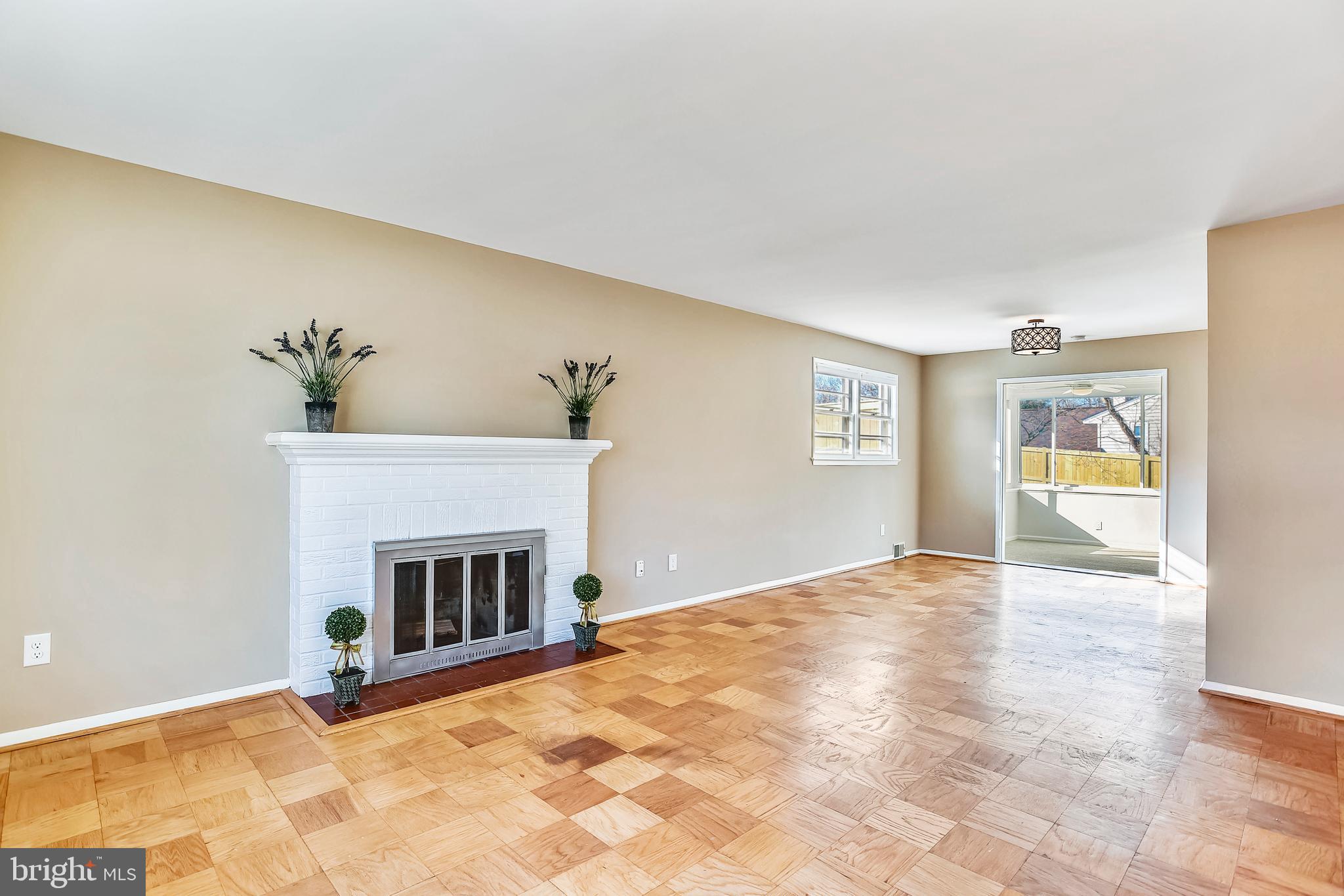 7308 Foxe Place Springfield, VA 22151 - Photo 9 of 38 a view of empty room with a fireplace