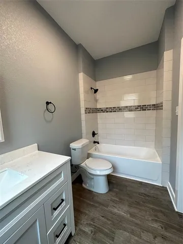 a bathroom with a double vanity sink and mirror