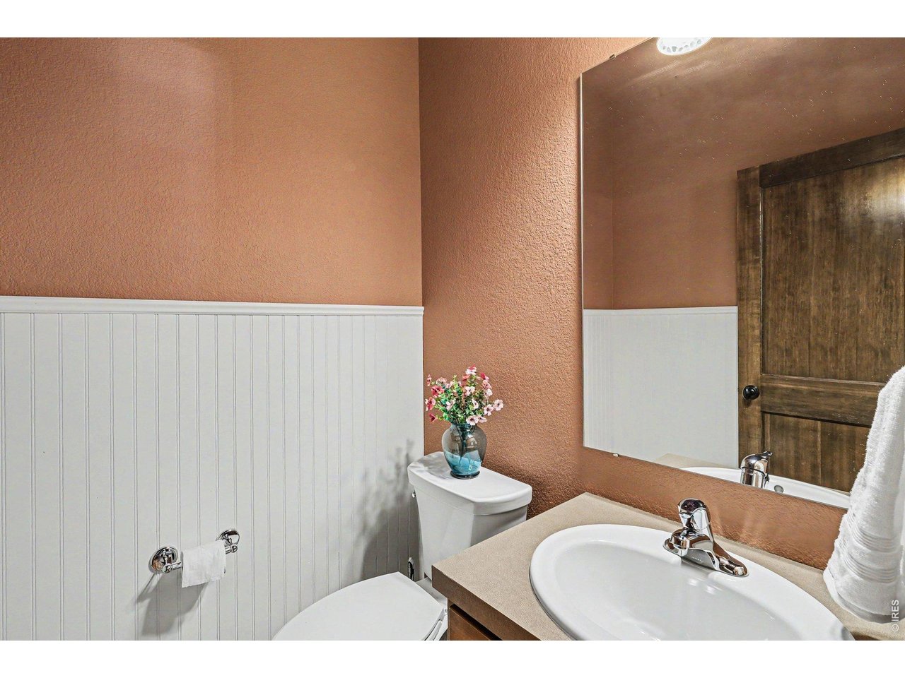 1302 Bennett Road Fort Collins, CO 80521 - Photo 7 of 36 Main floor powder bathroom