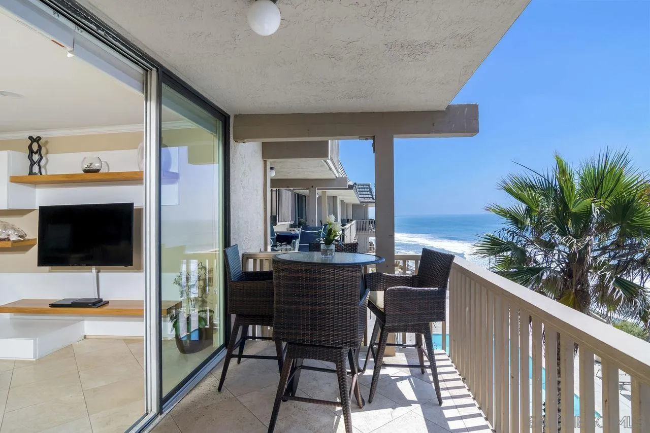 833 Beach Front Drive, Unit C Solana Beach, CA 92075 - Photo 21 of 25 a view of a living room and a flat screen tv