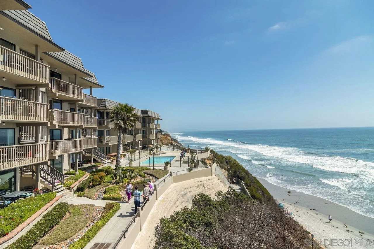 833 Beach Front Drive, Unit C Solana Beach, CA 92075 - Photo 23 of 25 a view of a swimming pool with outdoor seating