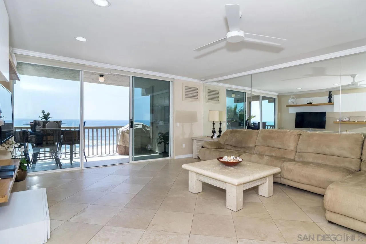 833 Beach Front Drive, Unit C Solana Beach, CA 92075 - Photo 8 of 25 a living room with furniture and a table