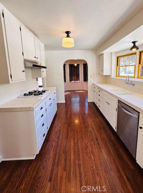 322 South Ohio Street Anaheim, CA 92805 - Photo 12 of 31 a kitchen with granite countertop a stove a sink and wooden floors