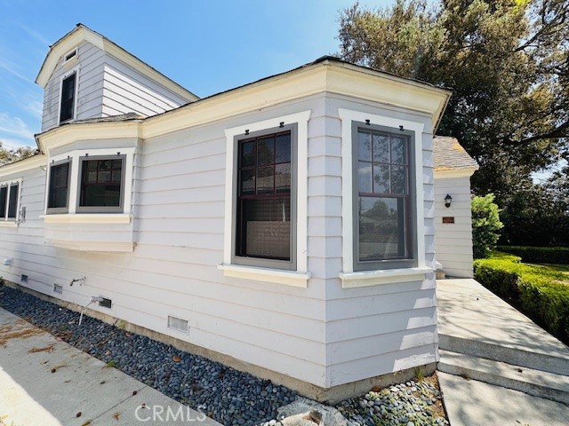 322 South Ohio Street Anaheim, CA 92805 - Photo 3 of 31 a front view of a house with a yard