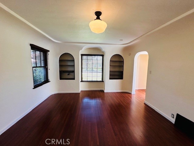 322 South Ohio Street Anaheim, CA 92805 - Photo 5 of 31 a view of empty room with wooden floor and fan