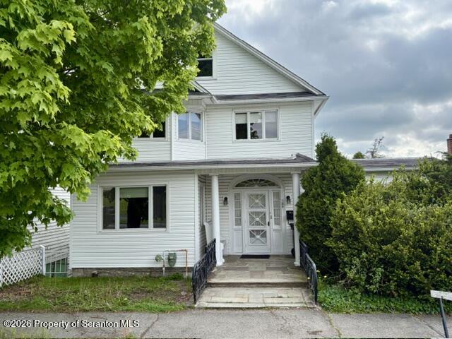 706 Delaware Street Forest City, PA 18421 - Photo 33 of 33 a front view of a house with a yard
