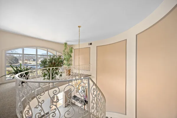 a street view with couple of cars parked