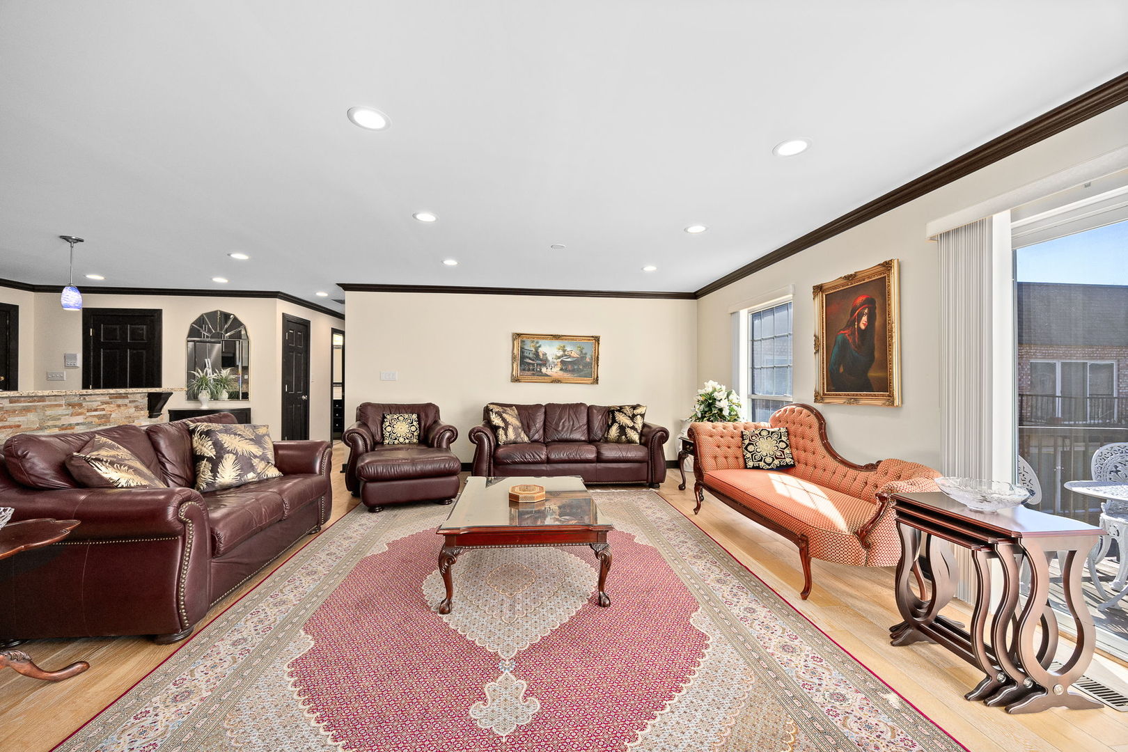 140 Carriage Way Drive, Unit C218 Burr Ridge, IL 60527 - Photo 7 of 33 a living room with furniture or couch and a large window
