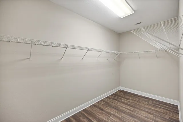 a view of a room with racks on the wall