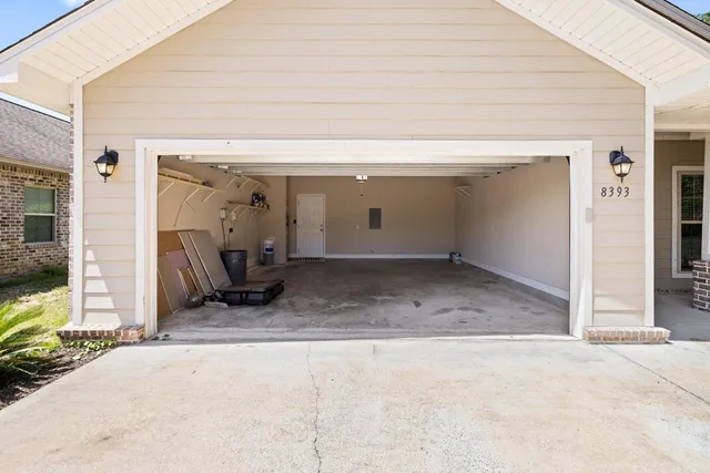 a view of a garage with furniture