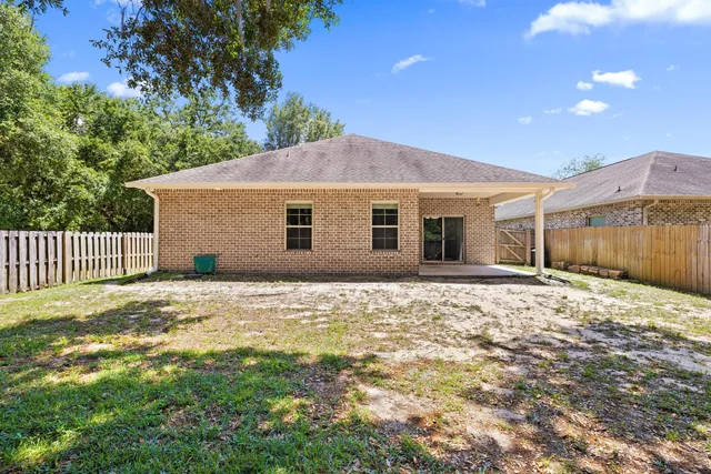 a front view of a house with a outdoor space