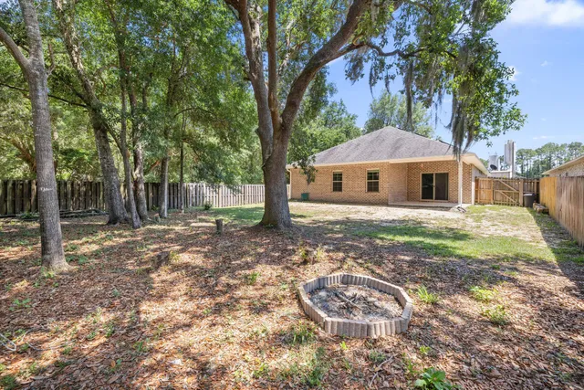 a view of backyard with green space