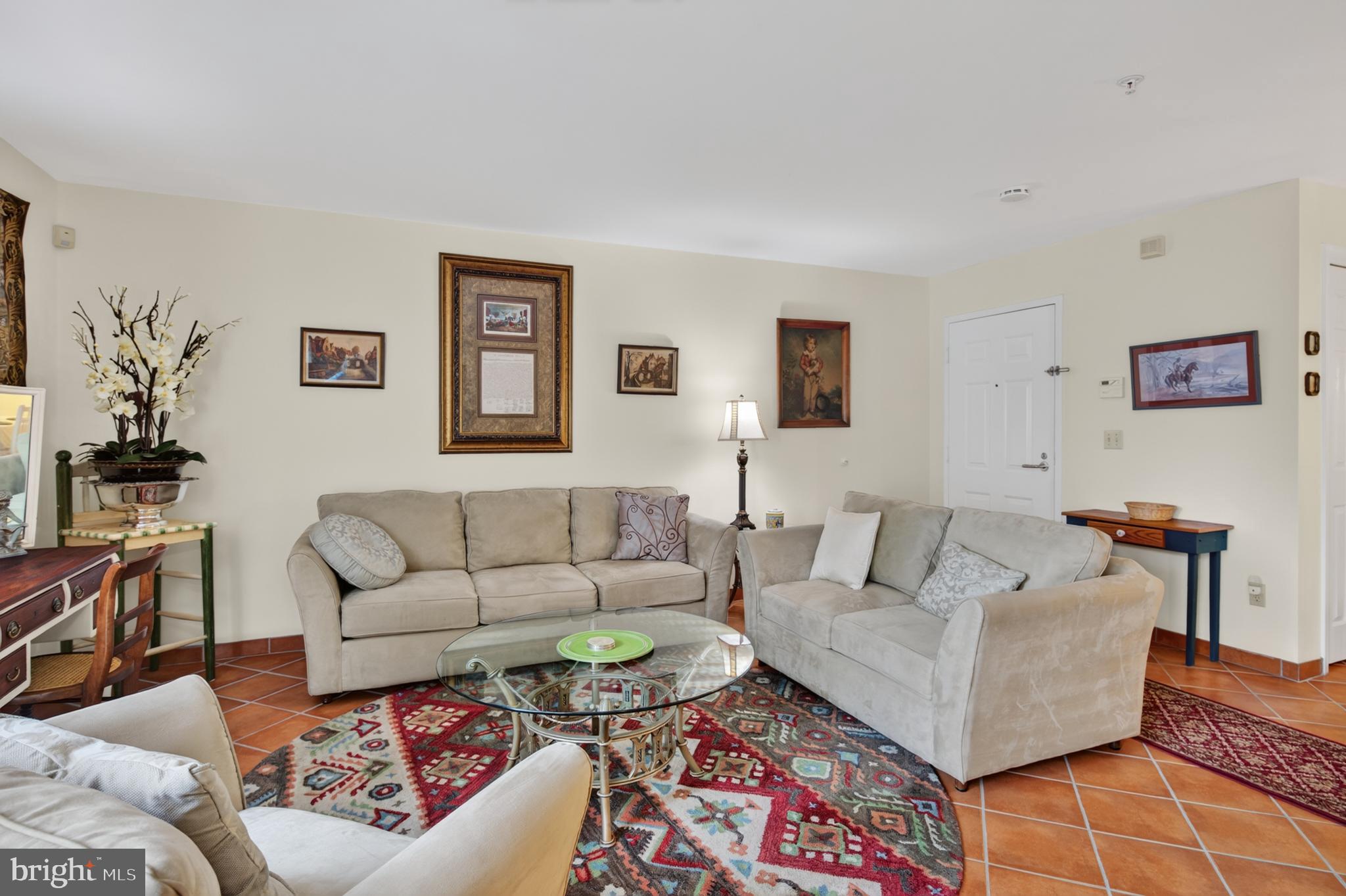 936 Bay Ridge Avenue, Unit 201 Annapolis, MD 21403 - Photo 13 of 40 a living room with furniture and a couch