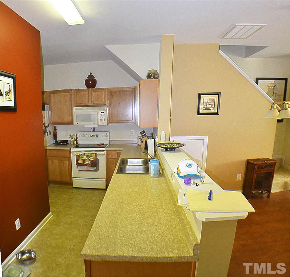 2149 Metacomet Way Raleigh, NC 27604 - Photo 6 of 11 a bed room with a bed and a couch