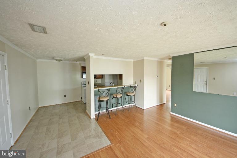 6410 Greenfield Road, Unit 1003 Elkridge, MD 21075 - Photo 20 of 23 Wood Pergo Flooring in Lining Room
