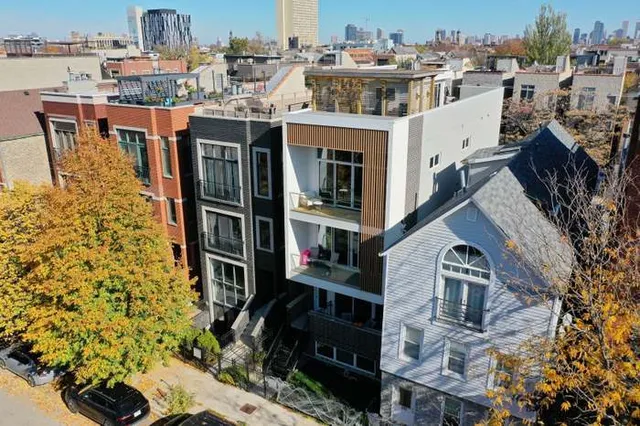 a view of a city with tall buildings