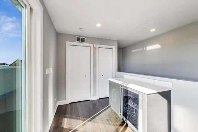 a view of livingroom with washer and dryer