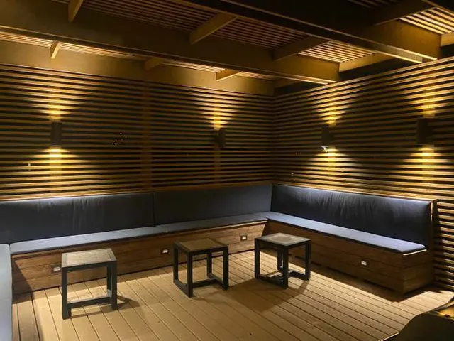 a view of sitting area with furniture and wooden floor