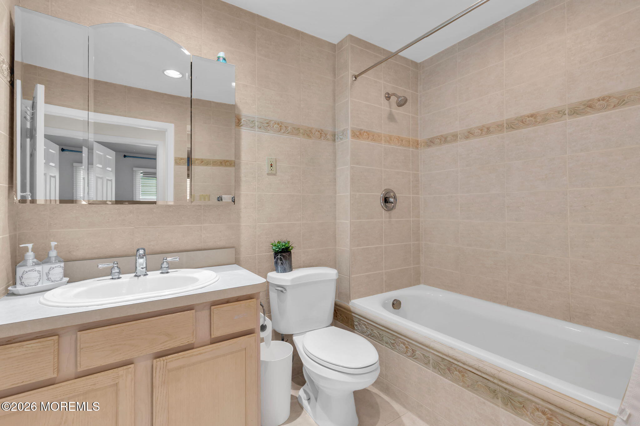101 Andover Lane Matawan, NJ 07747 - Photo 31 of 51 a bathroom with a sink a toilet and a bathtub