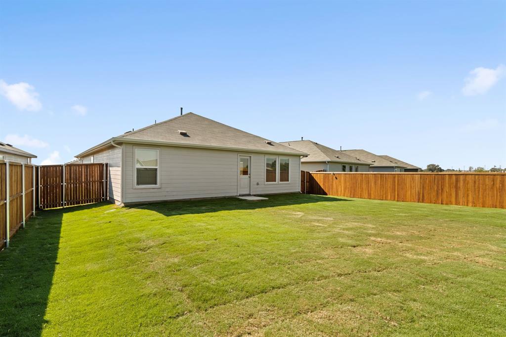 11333 Rodeo Drive Providence Village, TX 76227 - Photo 24 of 39 a big house with a big yard