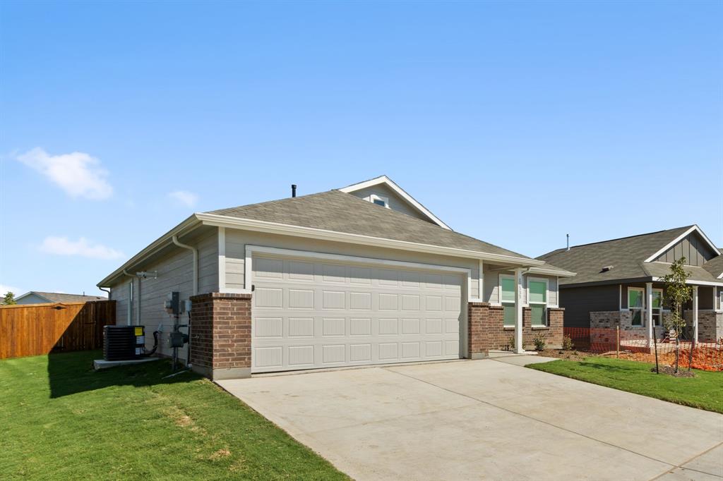 11333 Rodeo Drive Providence Village, TX 76227 - Photo 3 of 39 a view of house and outdoor space