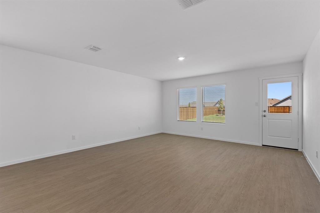 11333 Rodeo Drive Providence Village, TX 76227 - Photo 7 of 39 an empty room with windows