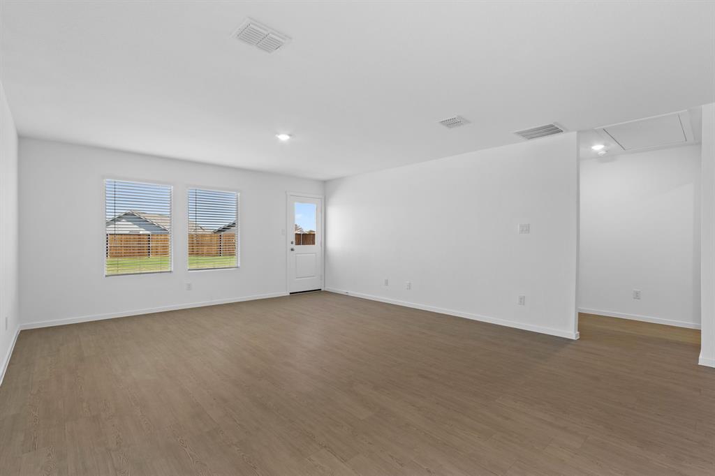 11333 Rodeo Drive Providence Village, TX 76227 - Photo 8 of 39 an empty room with windows