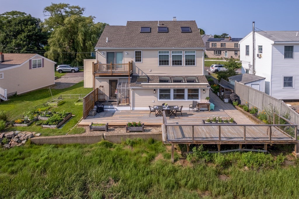 a aerial view of a house with a yard