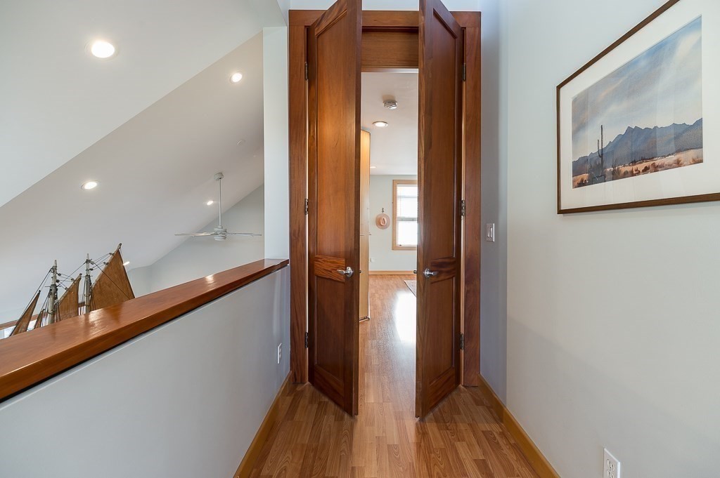 8 Rio Drive Gloucester, MA 01930 - Photo 15 of 33 a view of a hallway with wooden floor
