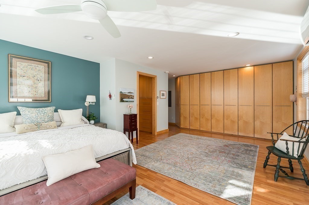 8 Rio Drive Gloucester, MA 01930 - Photo 16 of 33 a bedroom with a large bed and large window