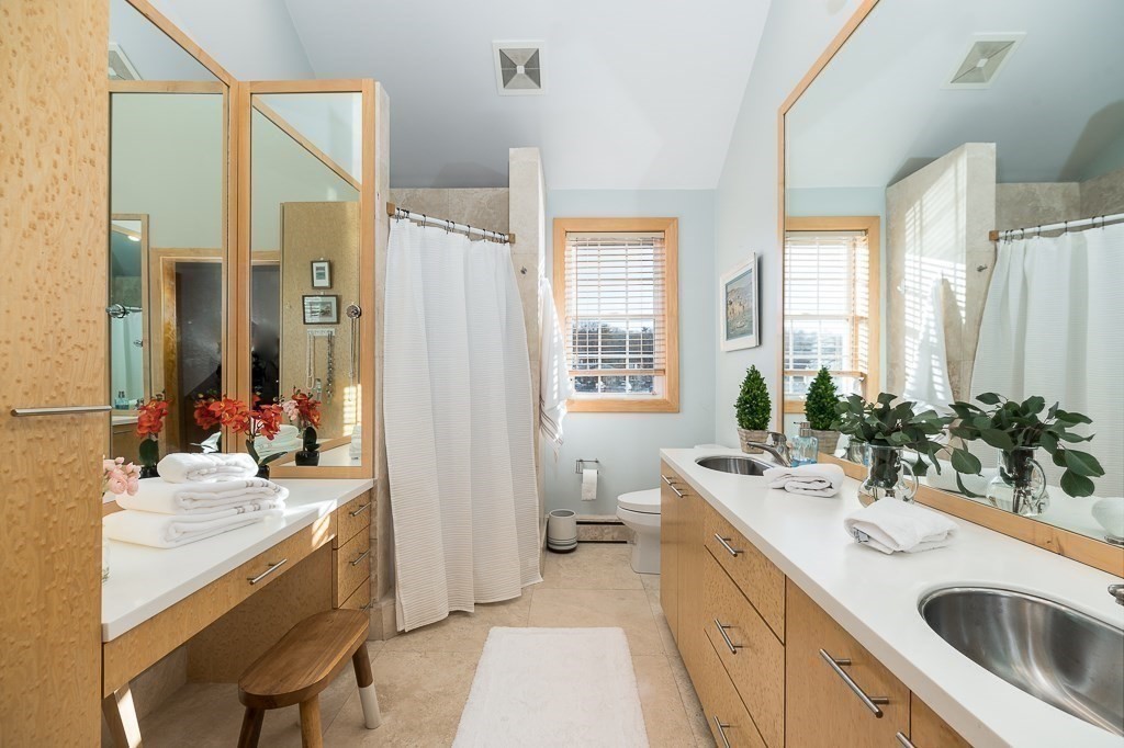8 Rio Drive Gloucester, MA 01930 - Photo 18 of 33 a bathroom with a sink and a mirror