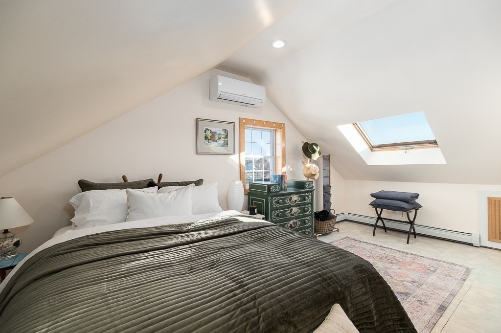 8 Rio Drive Gloucester, MA 01930 - Photo 23 of 33 a bedroom with a bed and a table