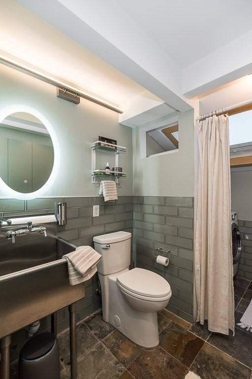 8 Rio Drive Gloucester, MA 01930 - Photo 27 of 33 a bathroom with a toilet a sink and mirror