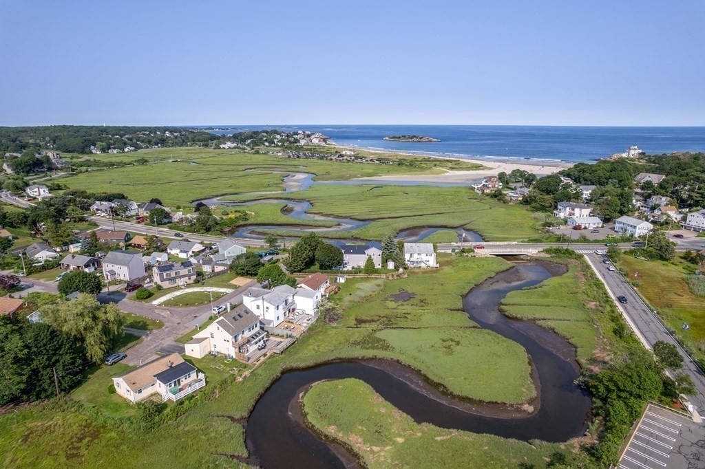 8 Rio Drive Gloucester, MA 01930 - Photo 3 of 33 a view of a lake in middle of the town