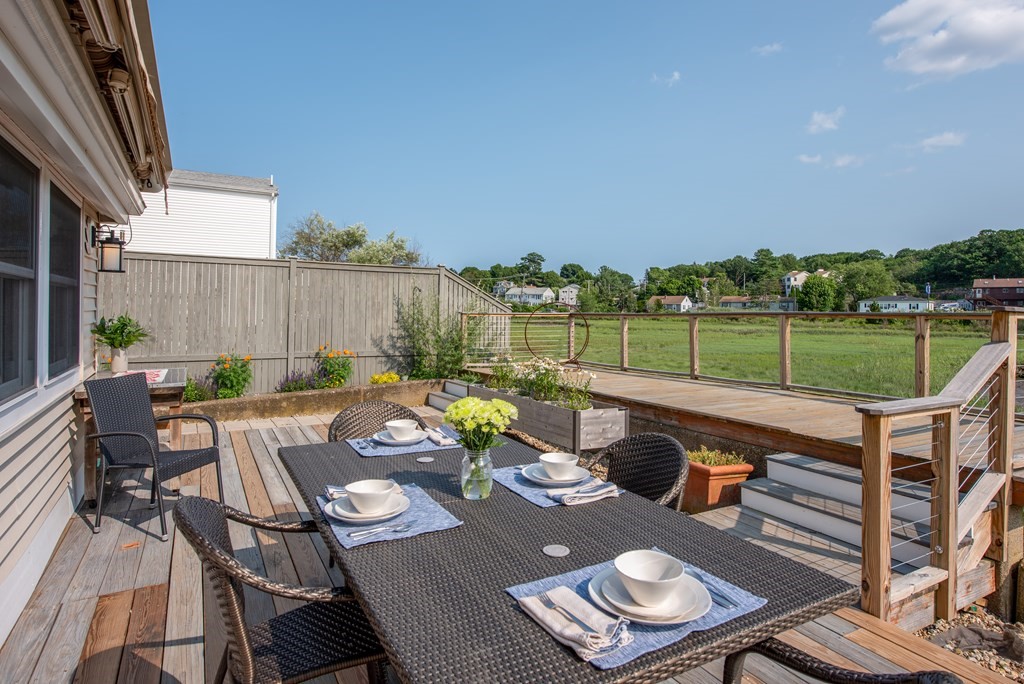 8 Rio Drive Gloucester, MA 01930 - Photo 31 of 33 a view of a patio with couple of chairs and a table