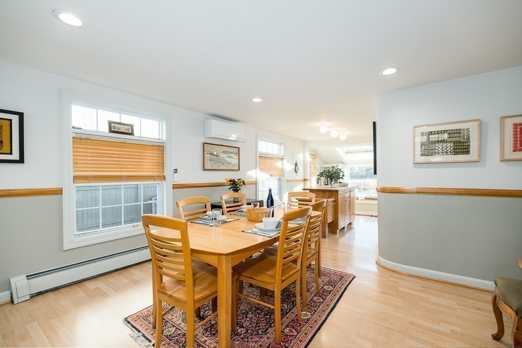 8 Rio Drive Gloucester, MA 01930 - Photo 8 of 33 a view of a dining room with furniture and a window
