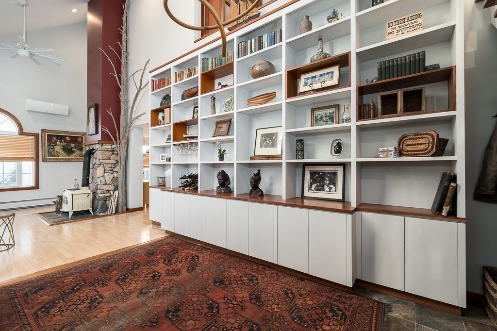 8 Rio Drive Gloucester, MA 01930 - Photo 10 of 33 a living room with furniture and a book shelf