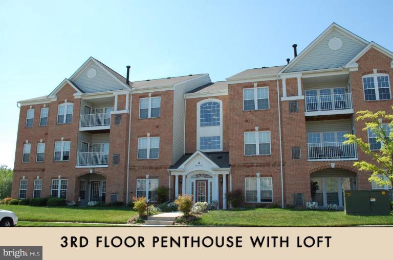 5238 Glenthorne Court, Unit 5238 Rosedale, MD 21237 - Photo 1 of 14 a front view of a building